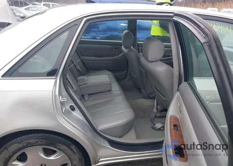 2004 Toyota Avalon Xls z USA, uszkodzony, nr VIN 4T1BF28B44U352002